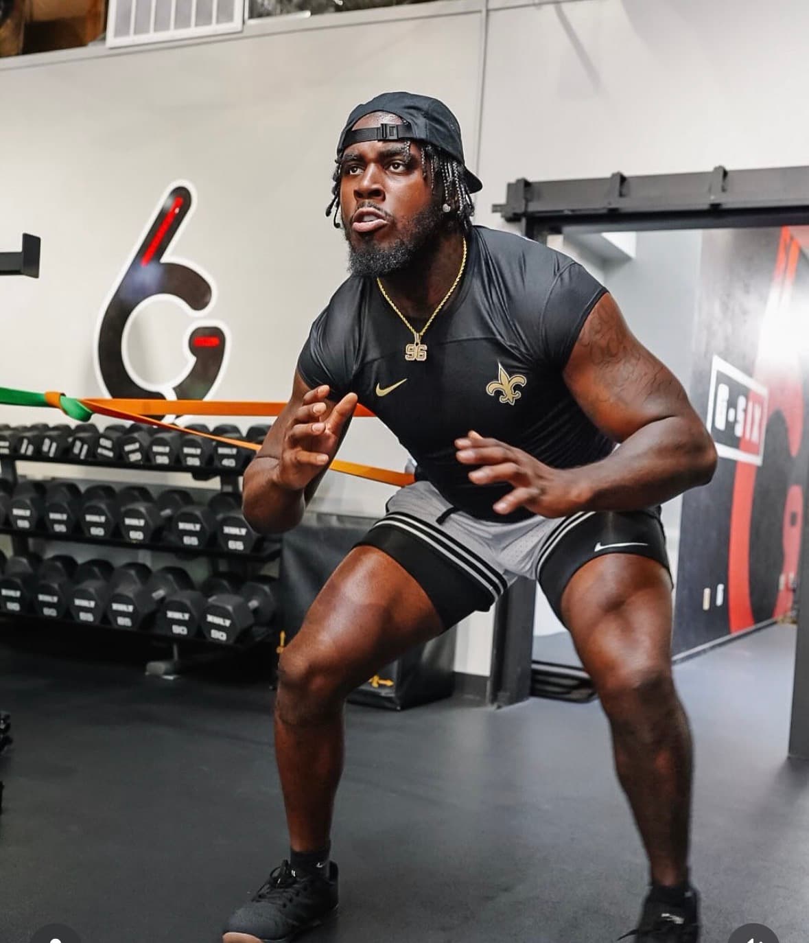 NFL Saints athlete performing reactive band work during football training at G6 Performance Sacramento