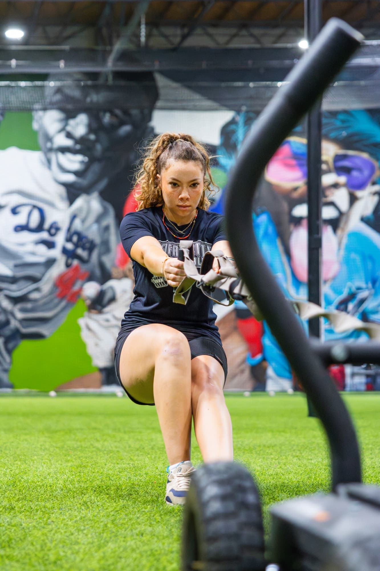 Softball athlete training with battle ropes at G6 Performance Sacramento